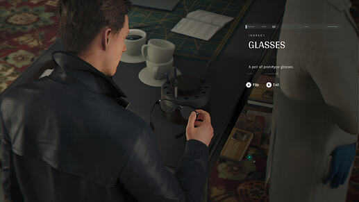 Glasses on Q desk 007FL 07JUN26